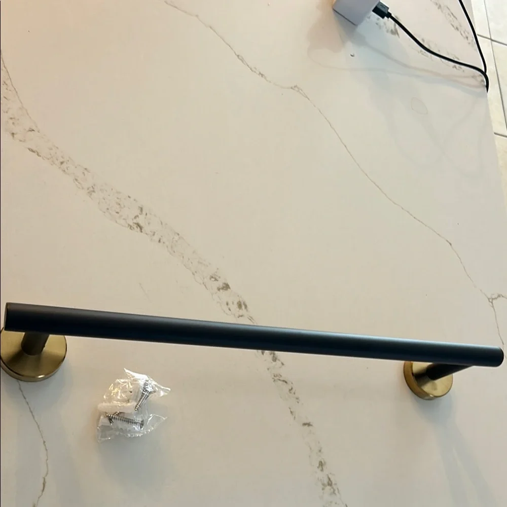 Elegant Black and Gold Towel Bar